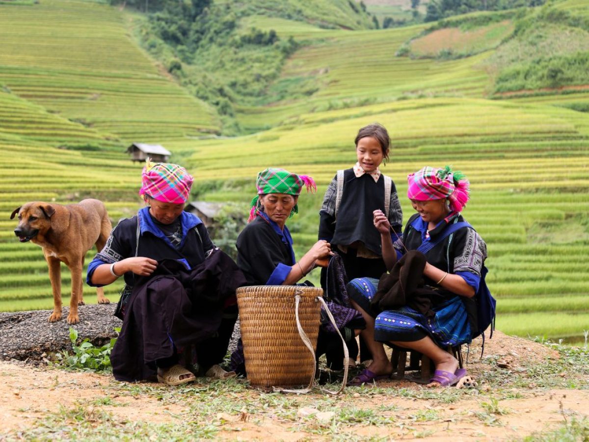 The Ha Giang Loop local women sewing traditional clothes